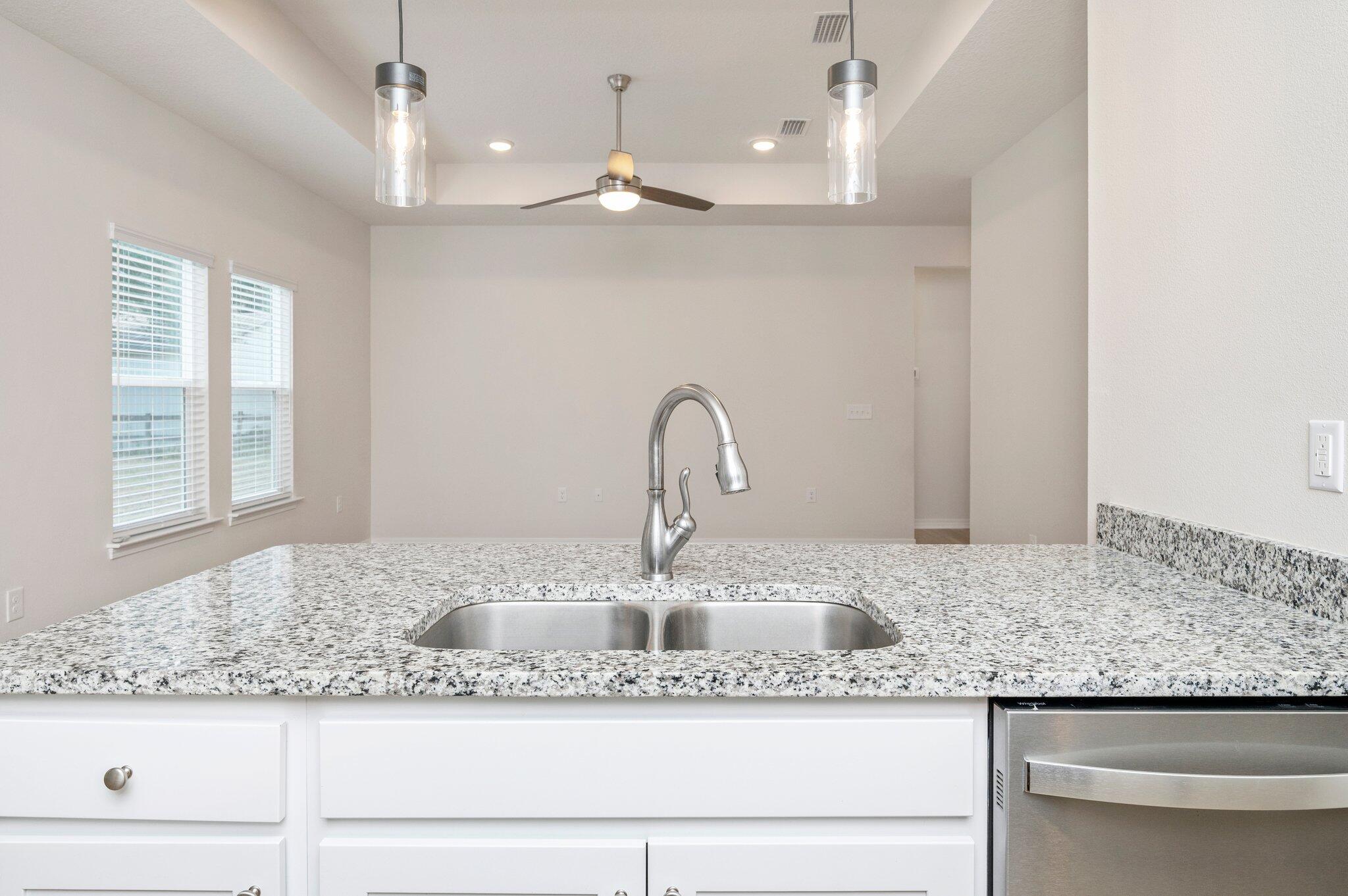 3156 Forrest Avenue Crestview, FL 32539 - Photo 15 of 44 a bathroom with a granite countertop sink and mirror