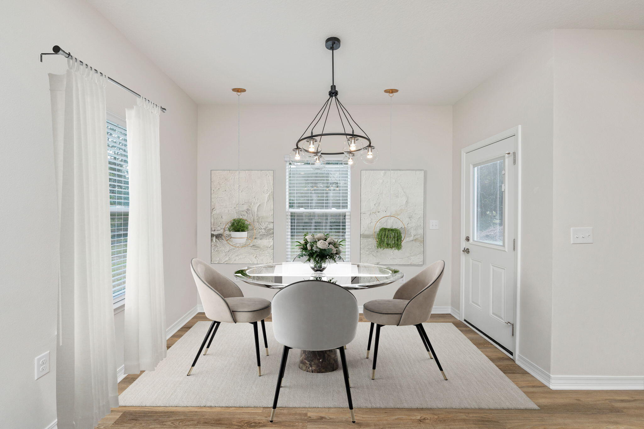 3156 Forrest Avenue Crestview, FL 32539 - Photo 16 of 44 a dining room with furniture a chandelier and wooden floor