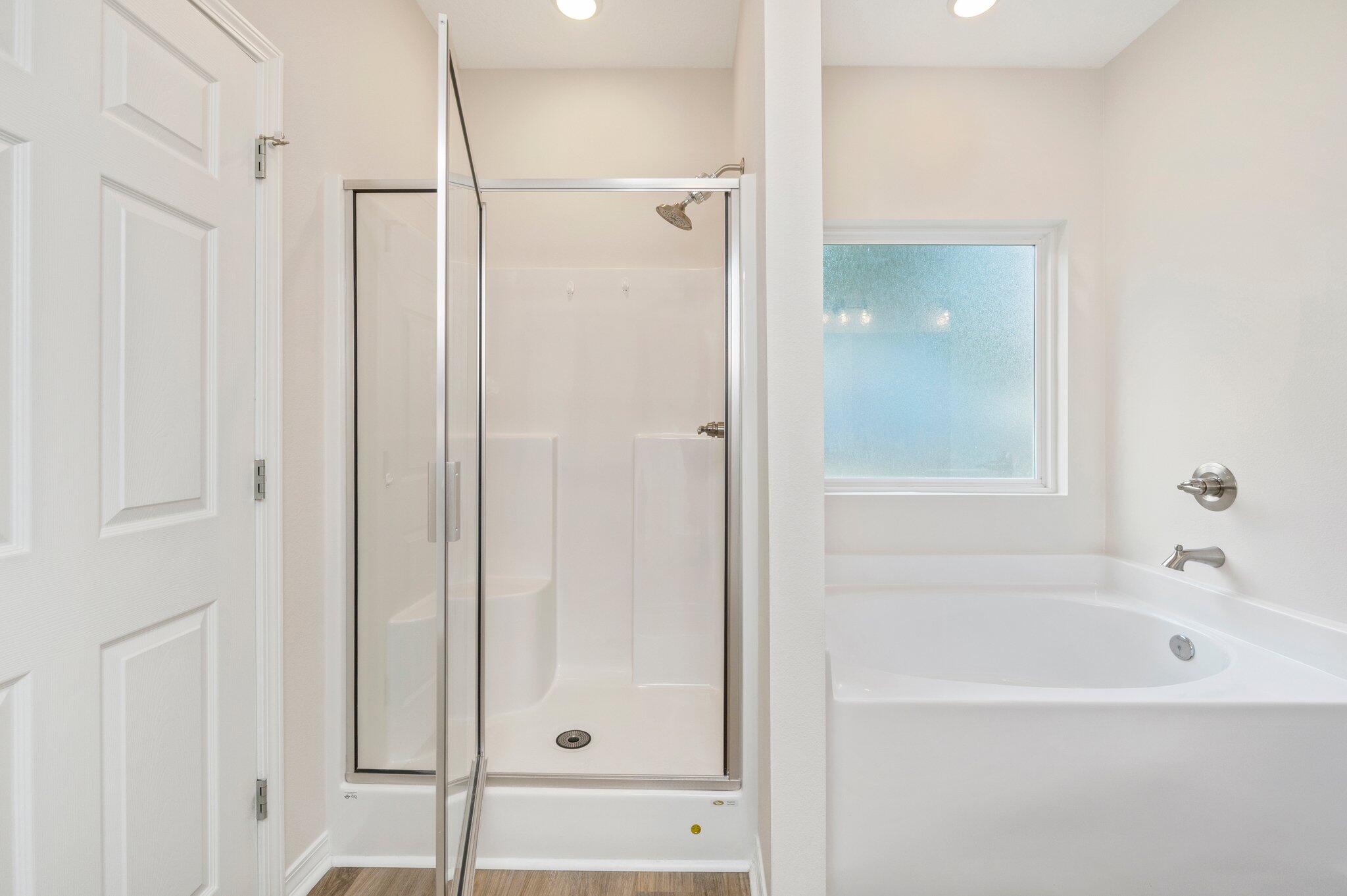 3156 Forrest Avenue Crestview, FL 32539 - Photo 26 of 44 a bathroom with a bathtub and shower