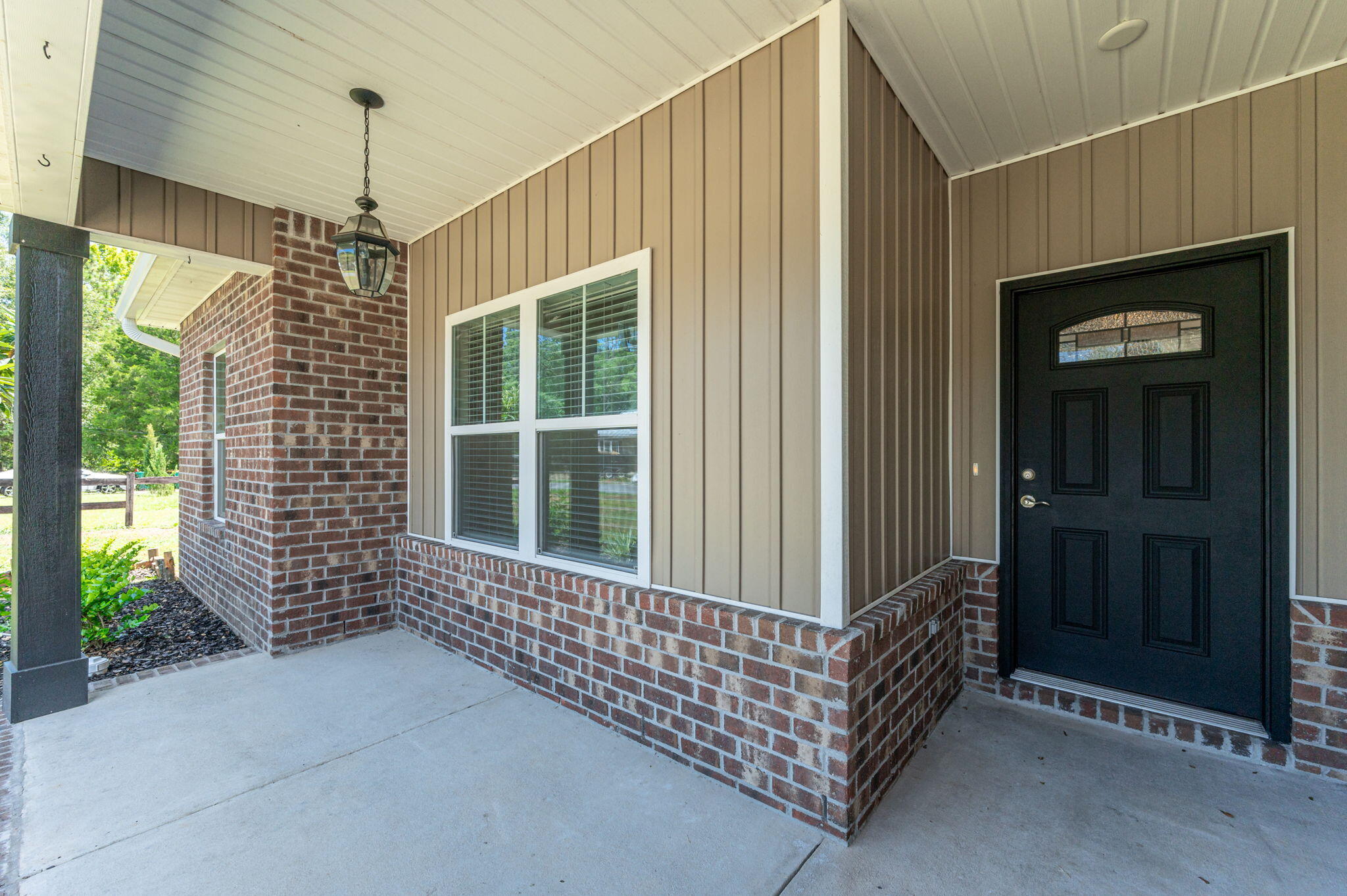 3156 Forrest Avenue Crestview, FL 32539 - Photo 3 of 44 a front view of a house with a garage