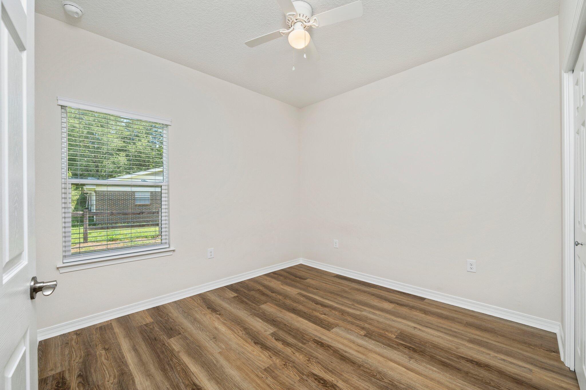 3156 Forrest Avenue Crestview, FL 32539 - Photo 32 of 44 an empty room with a window