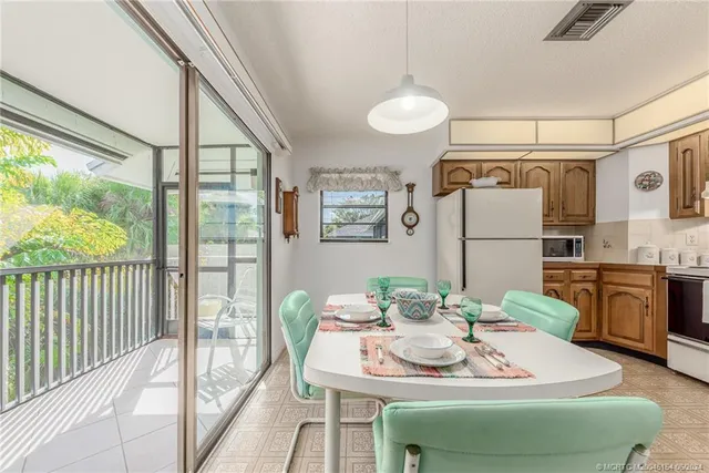 a bathroom with a shower a toilet and a sink