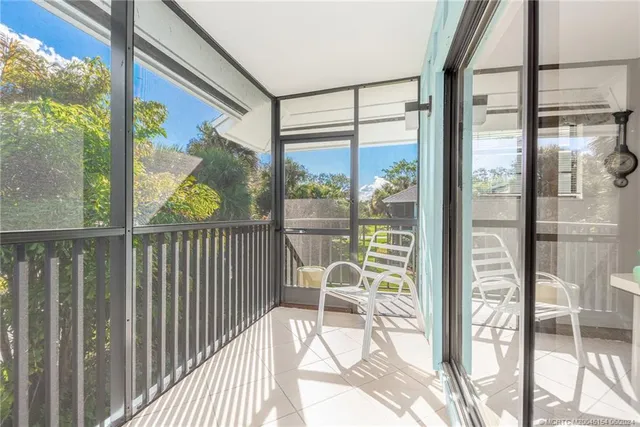 a bathroom with a granite countertop sink toilet a mirror and shower