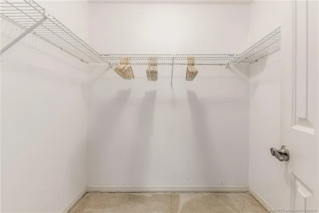 a view of backyard with a deck