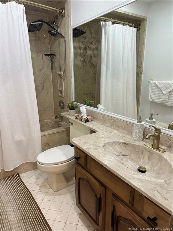 4095 Southeast Centerboard Lane, Unit 6B Stuart, FL 34997 - Photo 34 of 83 a bathroom with a sink and a mirror