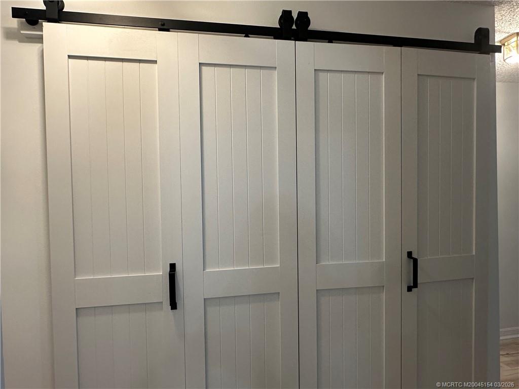 4095 Southeast Centerboard Lane, Unit 6B Stuart, FL 34997 - Photo 39 of 83 a bathroom with a shower