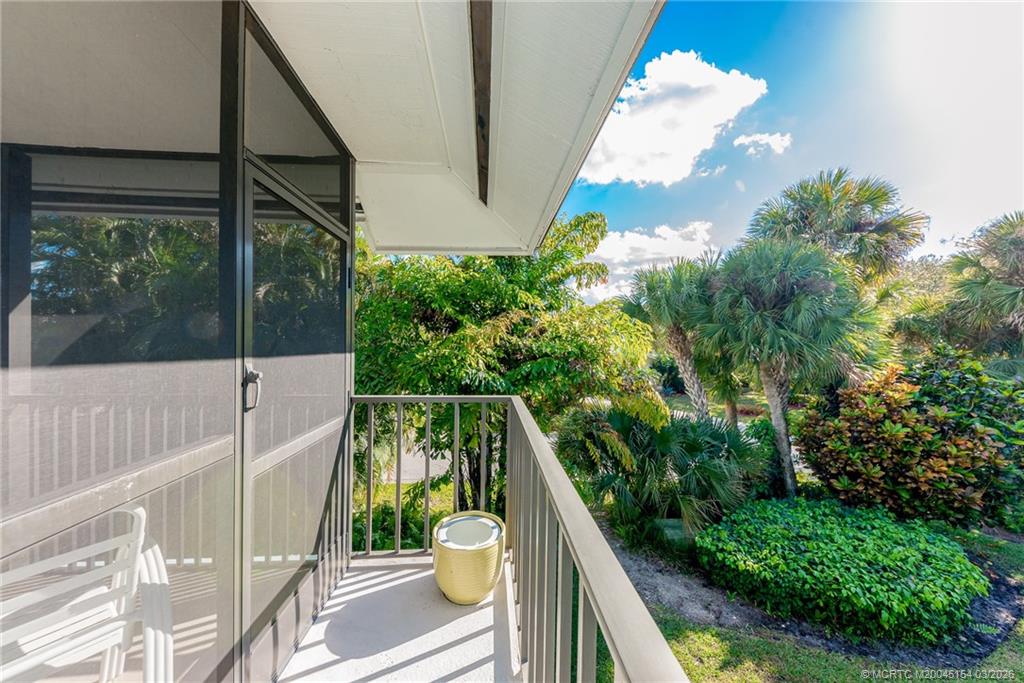 4095 Southeast Centerboard Lane, Unit 6B Stuart, FL 34997 - Photo 42 of 83 a view of balcony with wooden floor