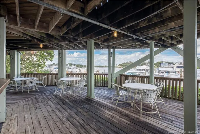 a view of a garden with a tree in the garden