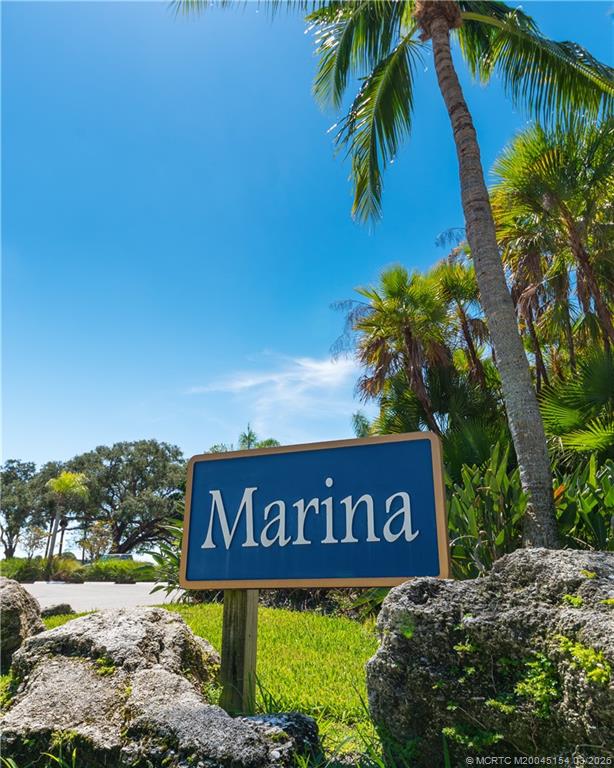 4095 Southeast Centerboard Lane, Unit 6B Stuart, FL 34997 - Photo 67 of 83 a sign that is on a pole
