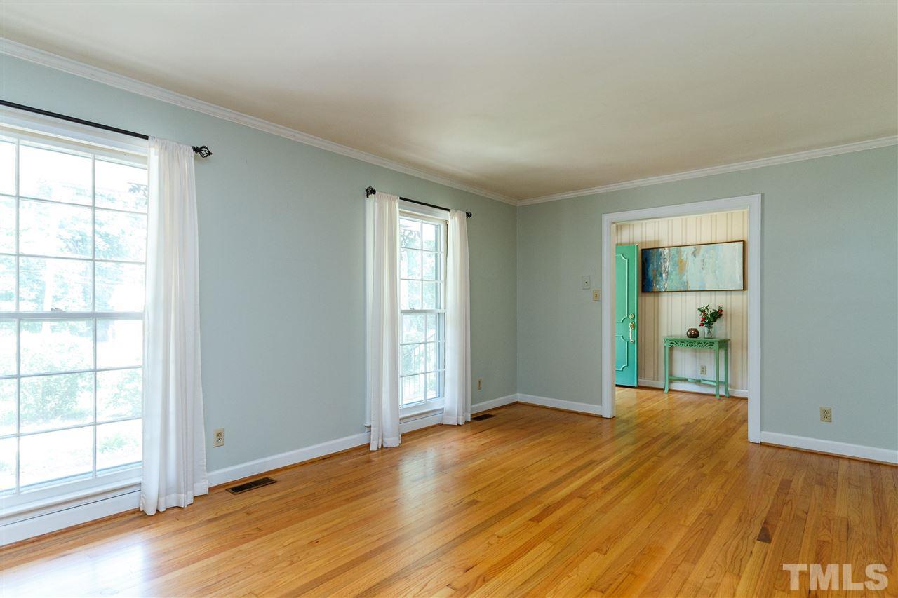 2108 Myron Drive Raleigh, NC 27607 - Photo 5 of 30 Living area with a view of the foyer.