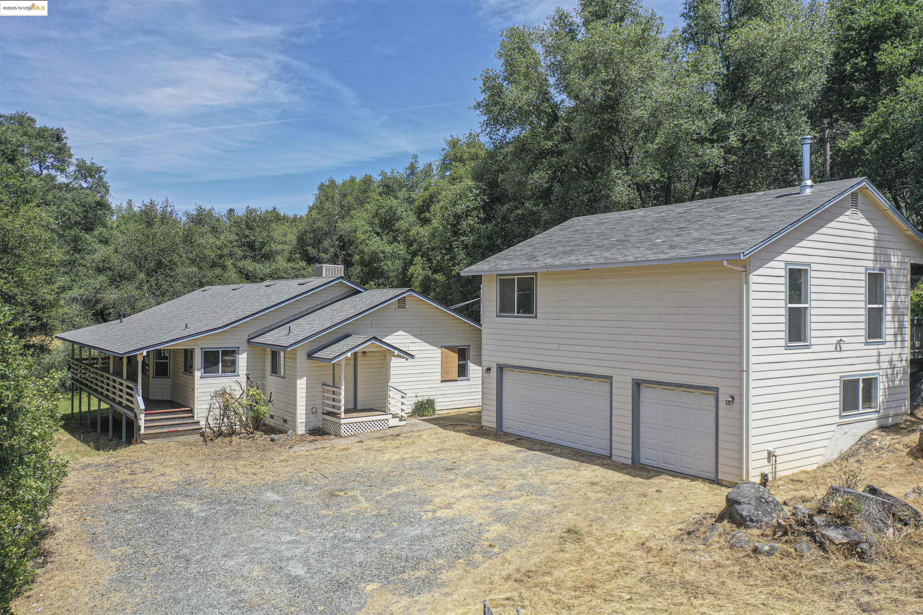 a house with trees in the background