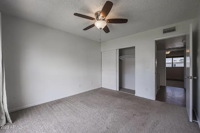 a view of an empty room and window