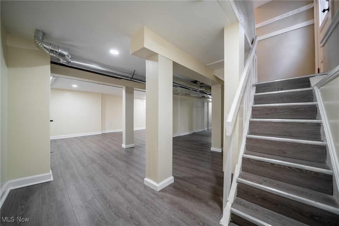 3816 Summit Park Road Cleveland Heights, OH 44121 - Photo 23 of 35 Below grade area featuring wood finished floors, stairway, and recessed lighting