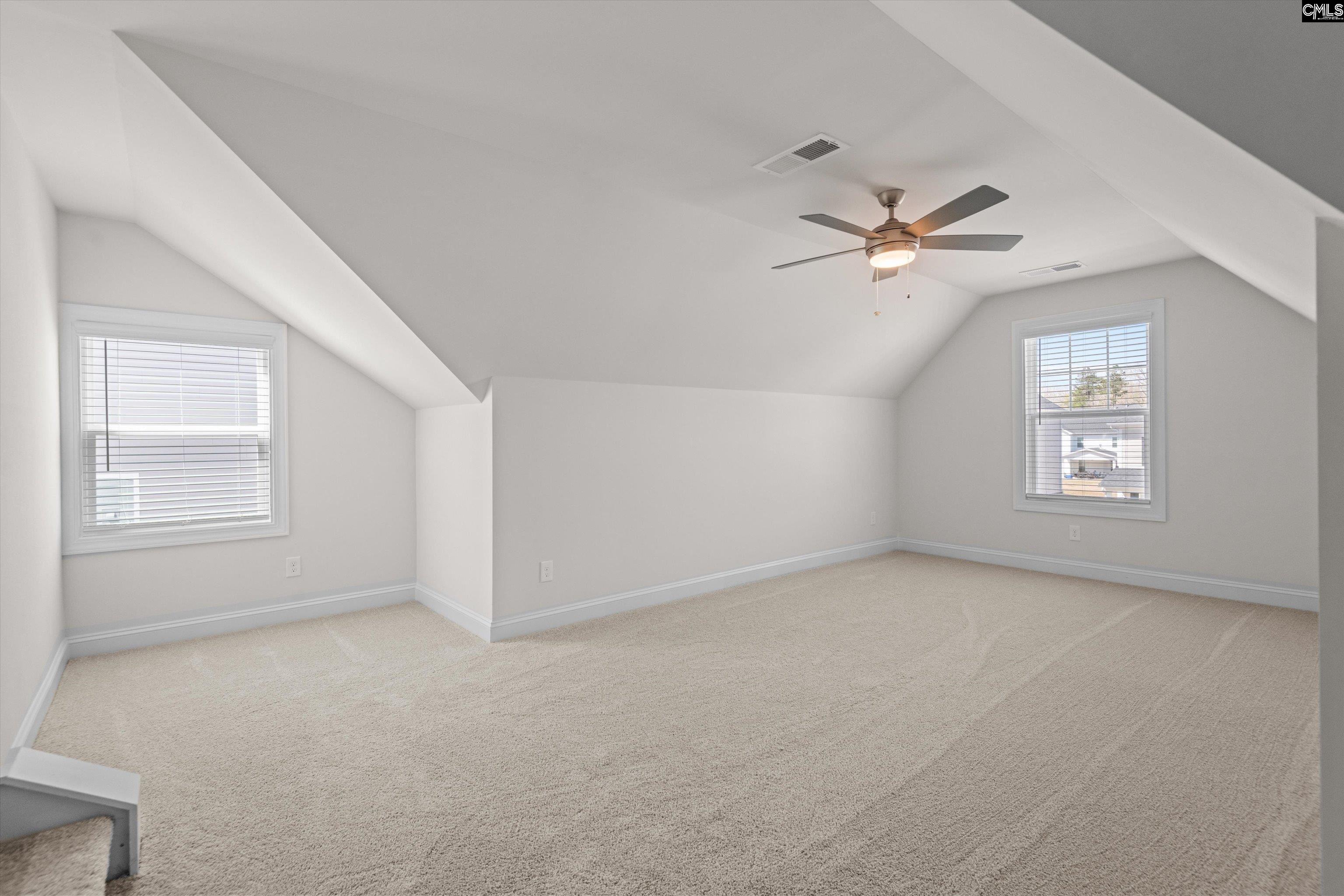 558 Wild Ginger Loop Irmo, SC 29063 - Photo 37 of 42 wooden floor in an empty room with a window