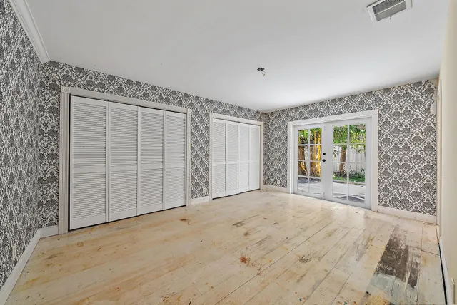 an empty room with windows