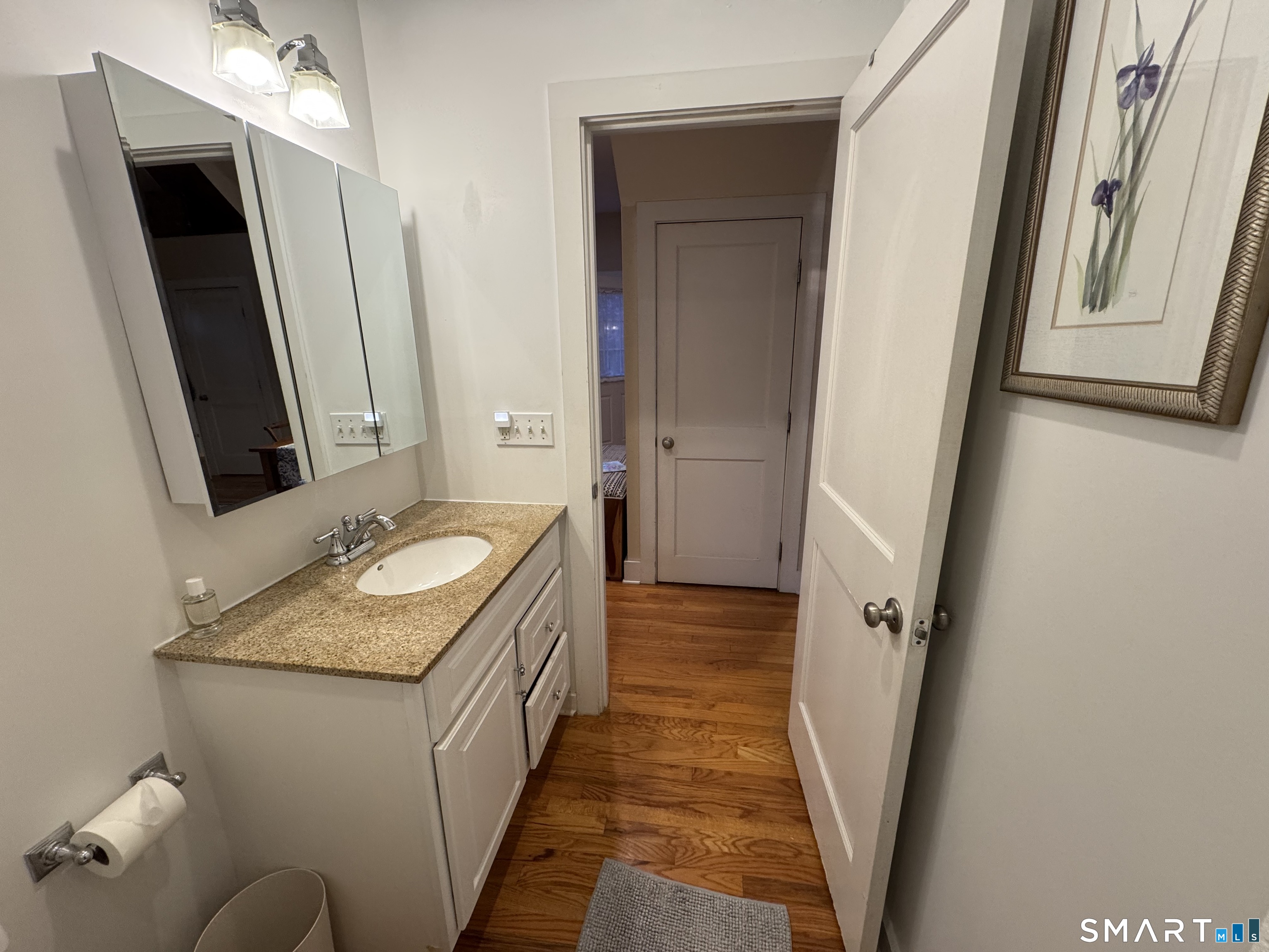 33 Copse Road, Unit B Madison, CT 06443 - Photo 12 of 16 a bathroom with bathtub sink and mirror