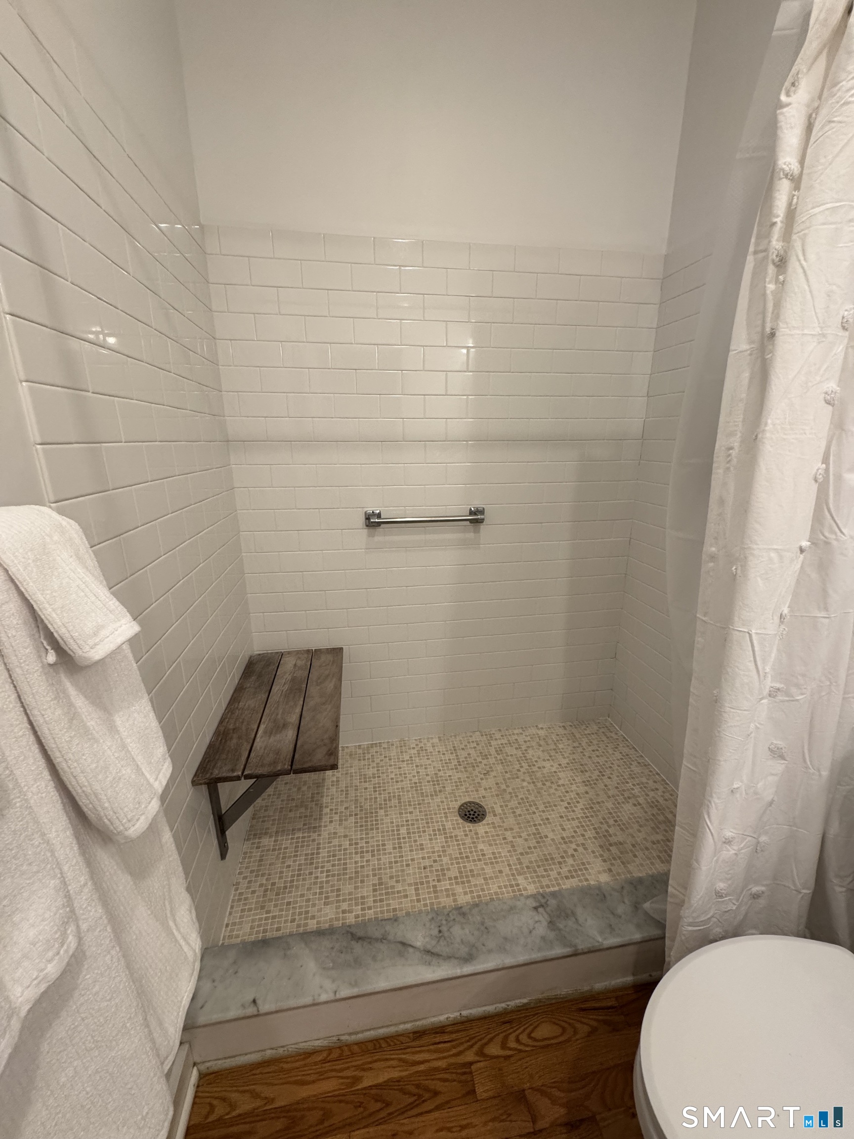 33 Copse Road, Unit B Madison, CT 06443 - Photo 13 of 16 a bathroom with a sink and a toilet