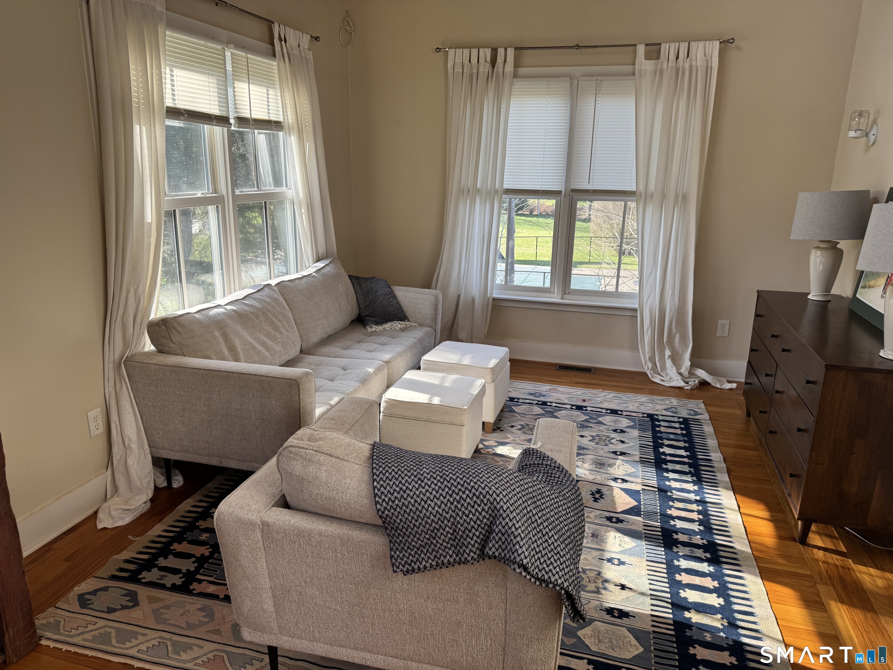 33 Copse Road, Unit B Madison, CT 06443 - Photo 15 of 16 a living room with furniture and a window