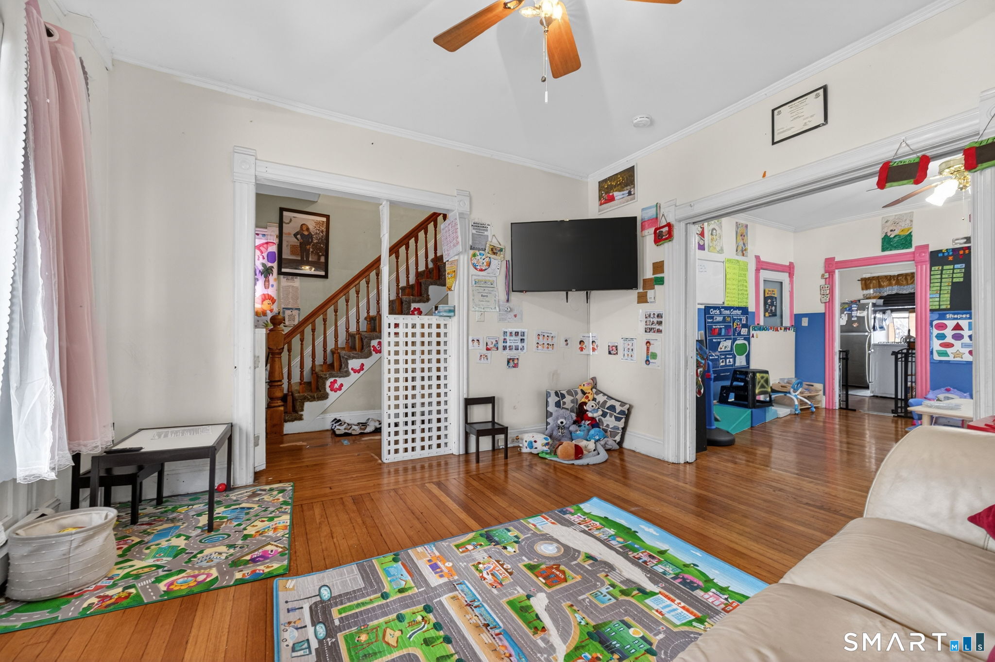 4 Robbins Court Norwich, CT 06360 - Photo 11 of 26 a living room with furniture and a flat screen tv