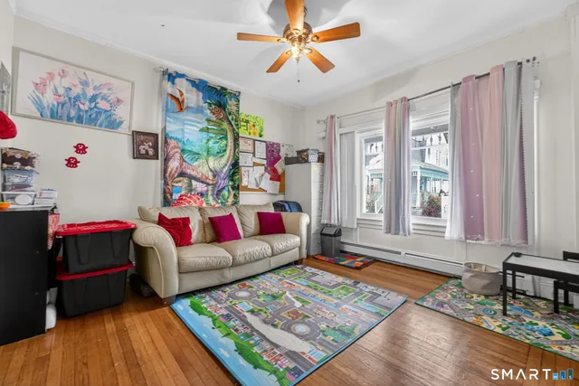 a living room with furniture and a window