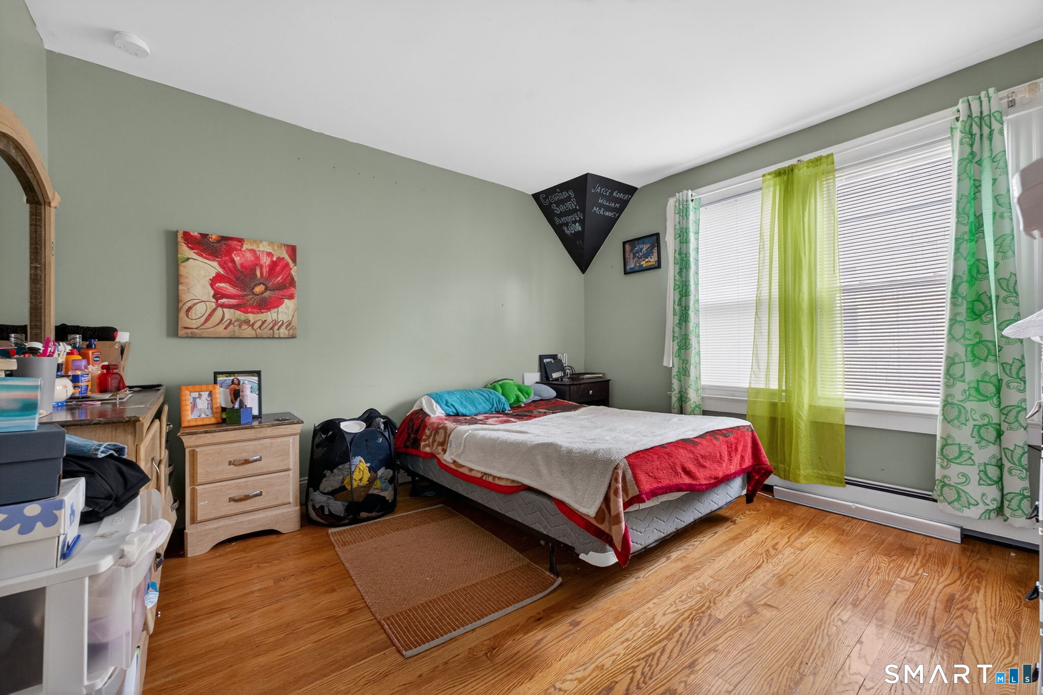 4 Robbins Court Norwich, CT 06360 - Photo 18 of 26 a room with a bed and a window