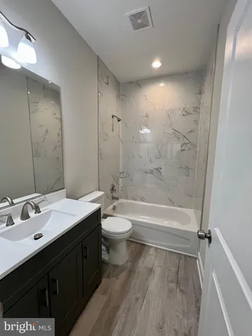 a view of a lake with a yard