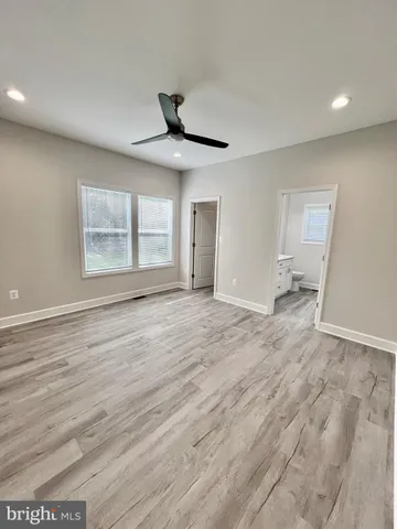 a front view of house with garden