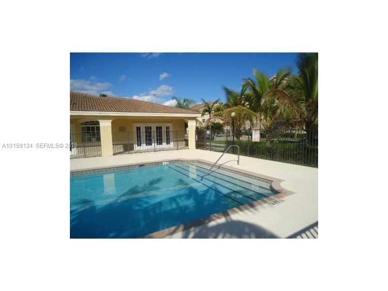 15480 Southwest 284th Street, Unit 2207 Homestead, FL 33033 - Photo 7 of 12 a view of a yard