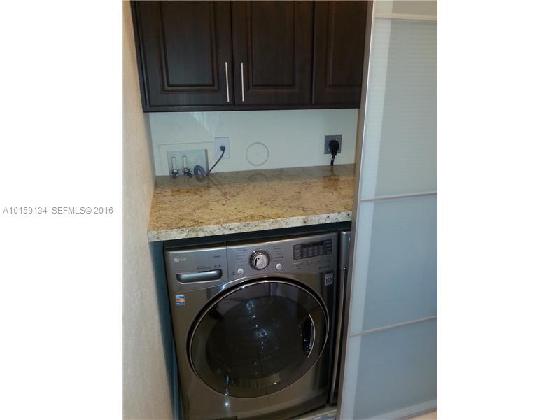 15480 Southwest 284th Street, Unit 2207 Homestead, FL 33033 - Photo 9 of 12 a utility room with dryer and washer