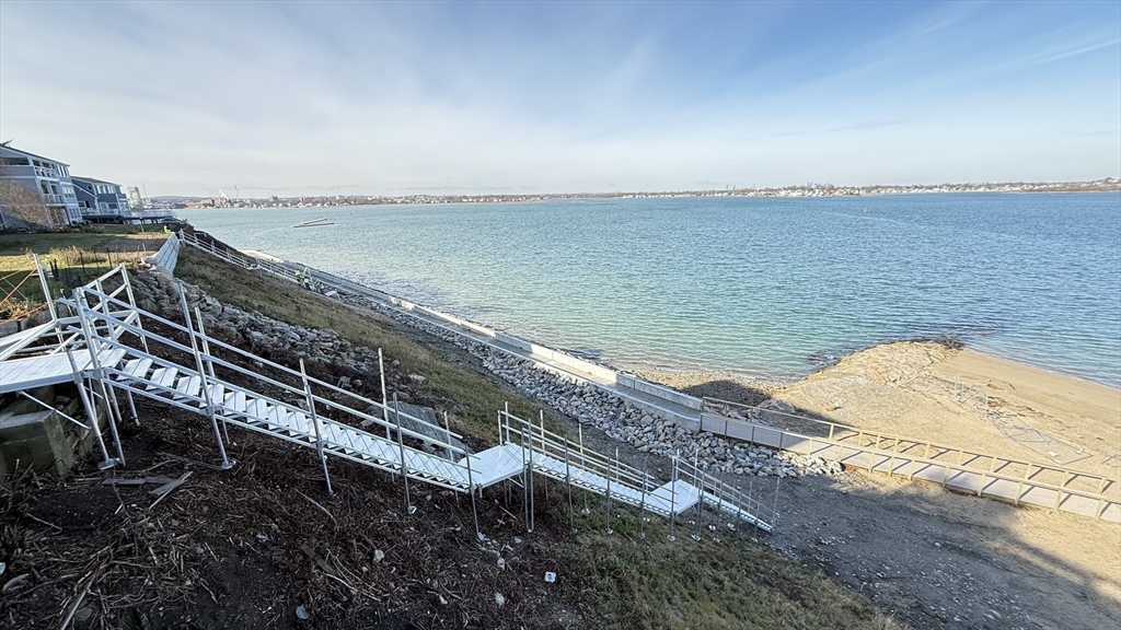 85 Regatta Road Weymouth, MA 02191 - Photo 26 of 33 a view of a ocean with a building in the background