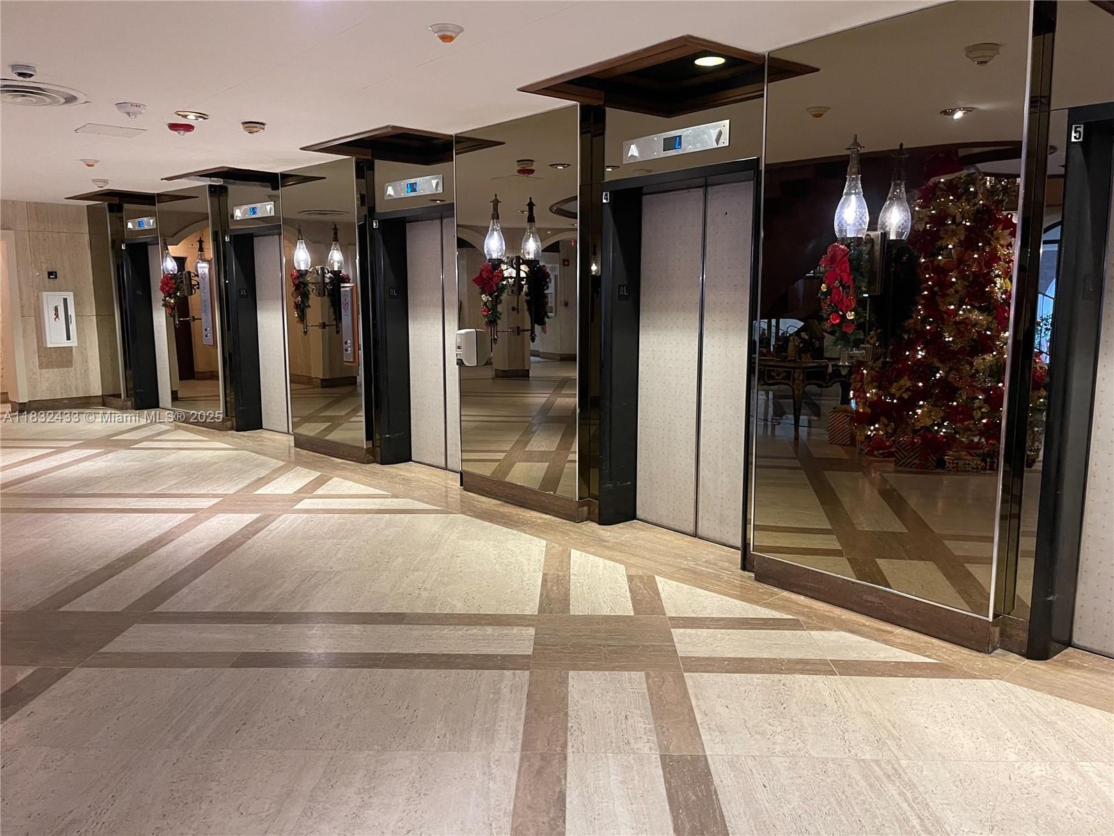 6039 Collins Avenue, Unit 823 Miami Beach, FL 33140 - Photo 20 of 21 a view of a entryway door