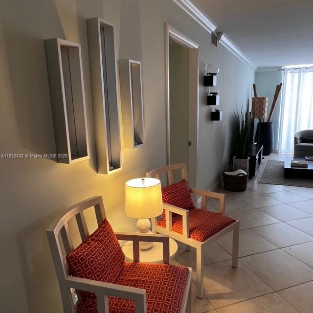 6039 Collins Avenue, Unit 823 Miami Beach, FL 33140 - Photo 6 of 21 a view of a room with gym equipment