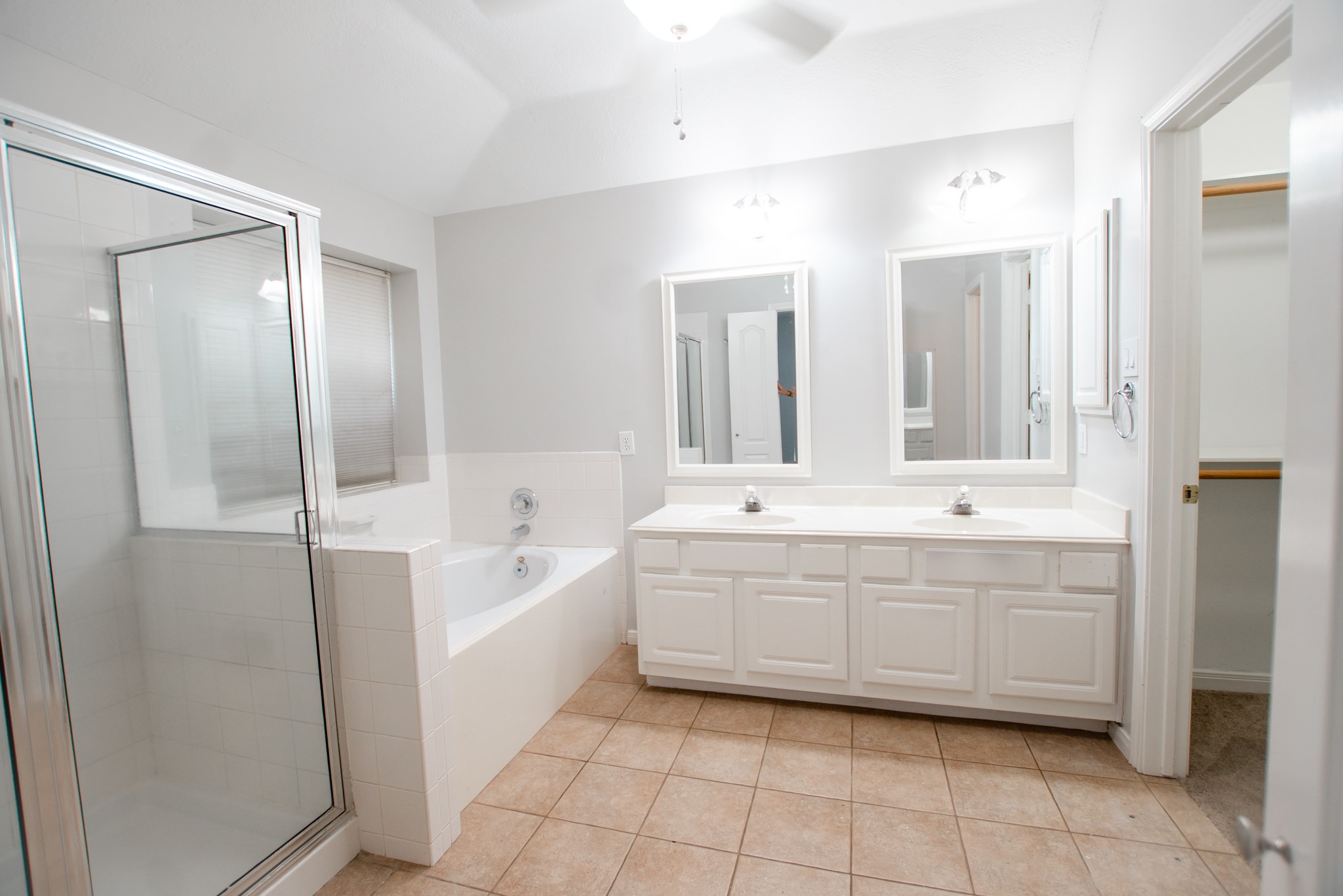 1722 Red Oak Terrace Houston, TX 77339 - Photo 14 of 22 a spacious bathroom with a bathtub shower and sink
