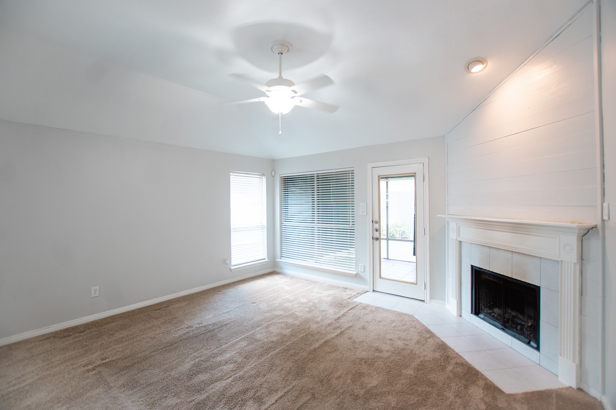 1722 Red Oak Terrace Houston, TX 77339 - Photo 15 of 22 a view of an empty room with window and fireplace