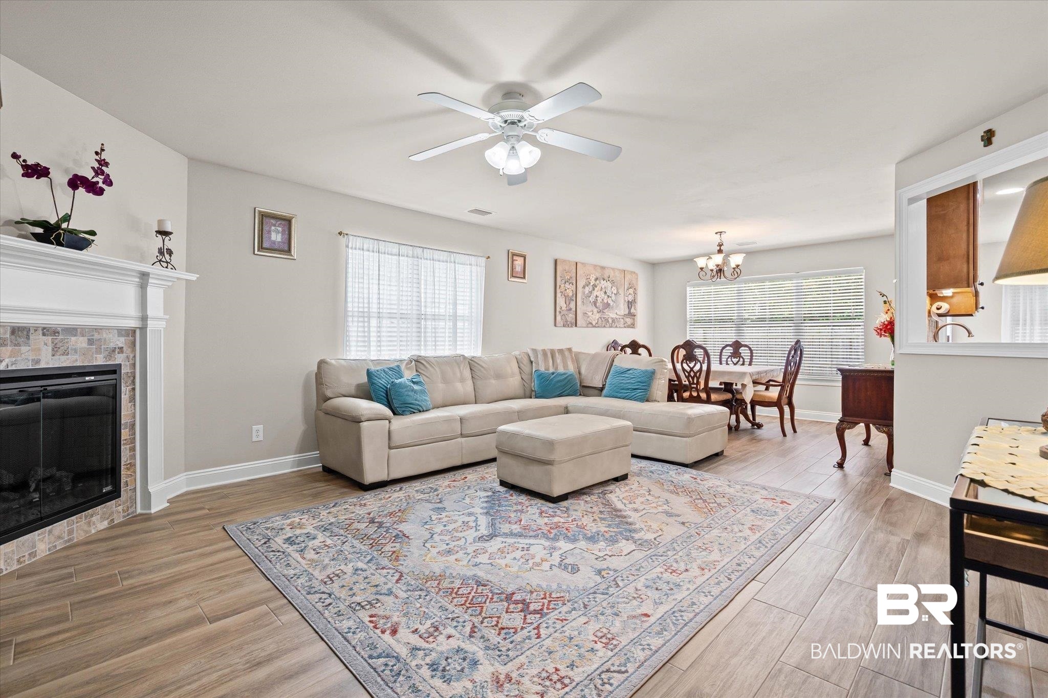 641 South Pine Street Foley, AL 36535 - Photo 2 of 22 Open concept living & dining space with electric fireplace.
