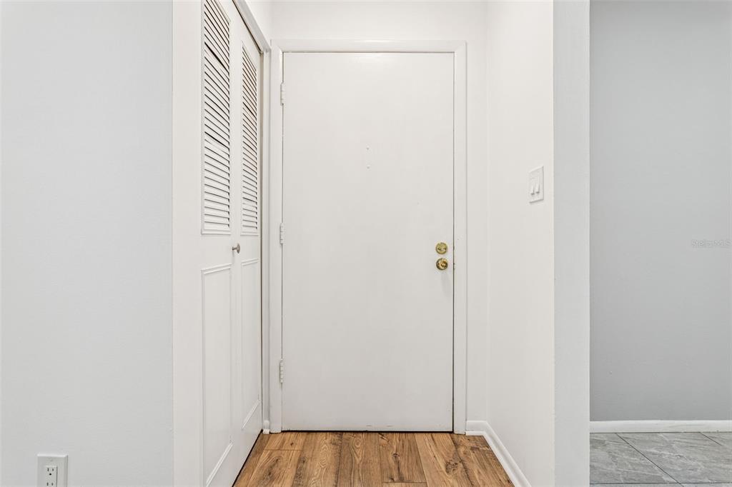 4606 West Gray Street, Unit 105 Tampa, FL 33609 - Photo 4 of 25 a view of a room with rack on the wall