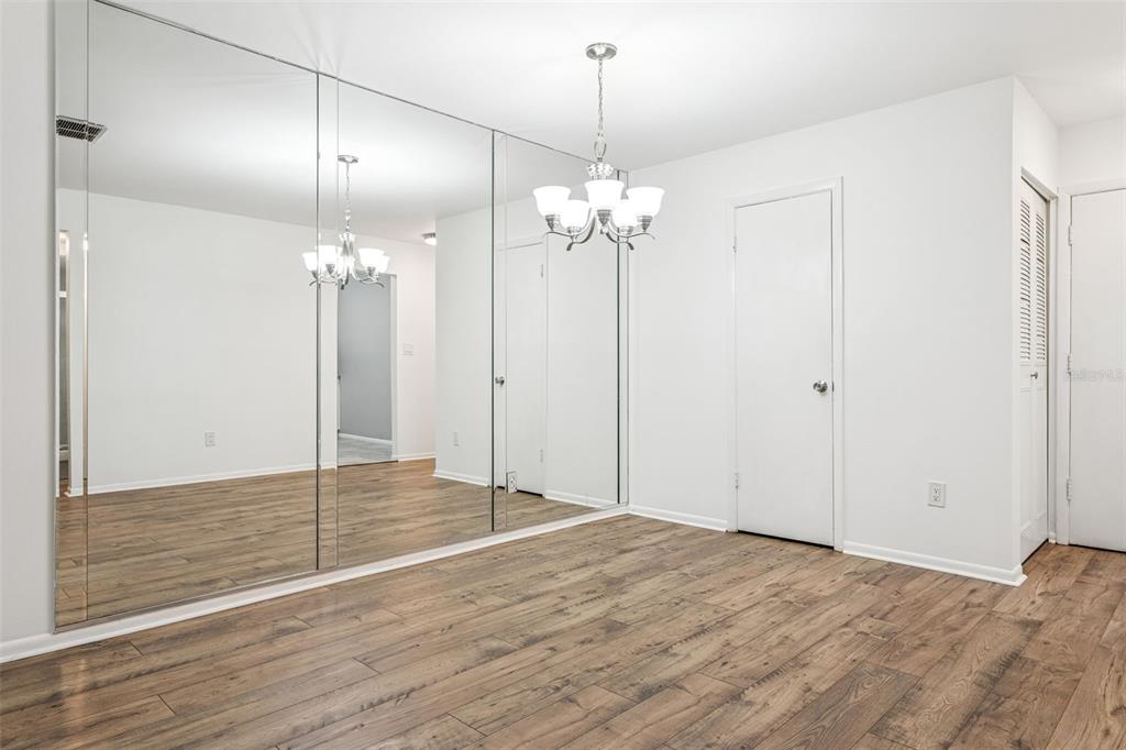 4606 West Gray Street, Unit 105 Tampa, FL 33609 - Photo 5 of 25 a view of a chandelier in a room