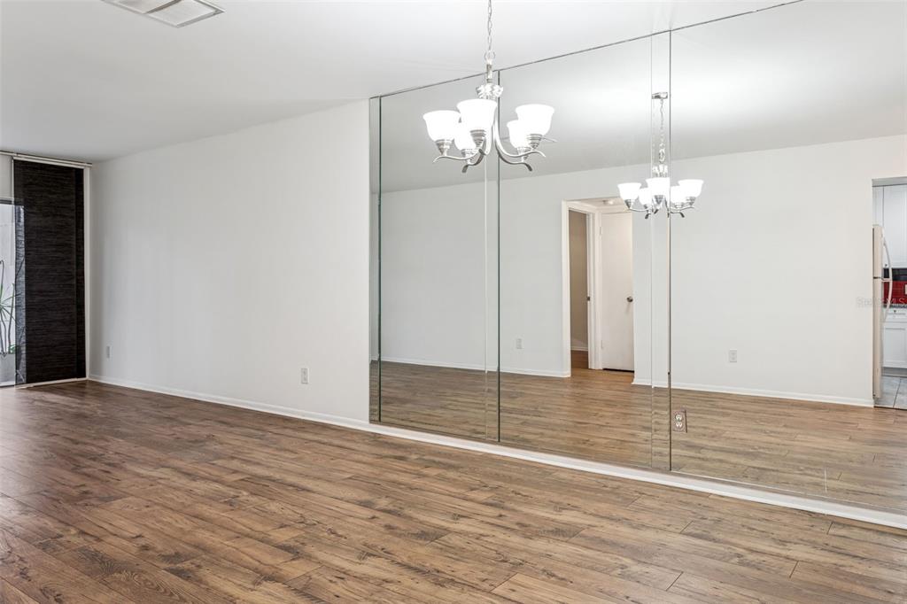 4606 West Gray Street, Unit 105 Tampa, FL 33609 - Photo 6 of 25 a view of a chandelier in a room