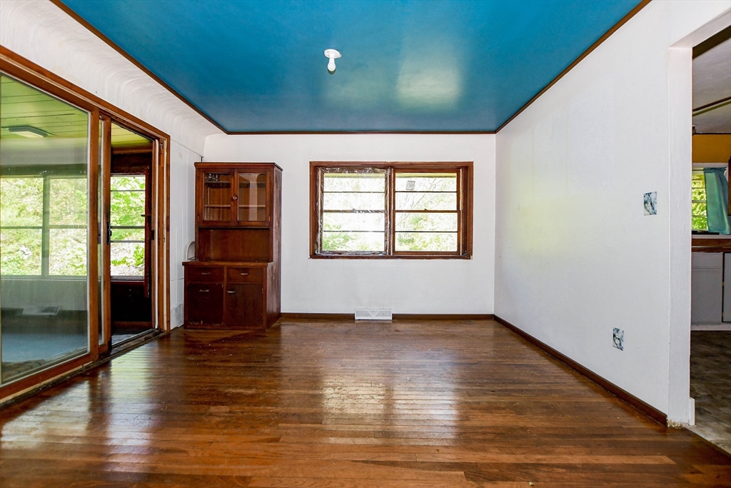 6 Gilbert Way Wareham, MA 02571 - Photo 8 of 41 an empty room with wooden floor and windows