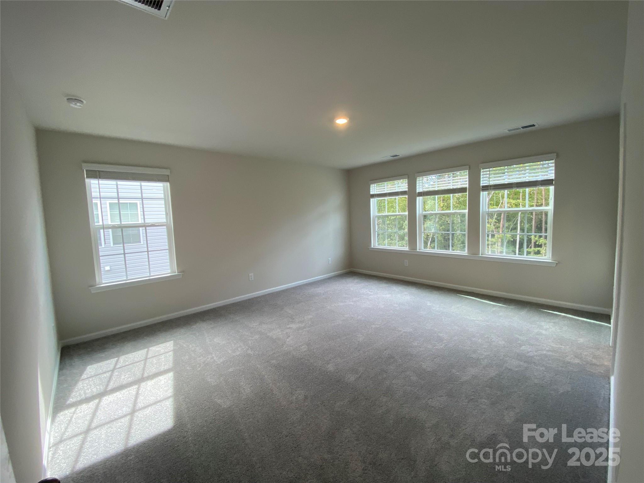 18219 Stark Way Charlotte, NC 28278 - Photo 19 of 42 an empty room with windows