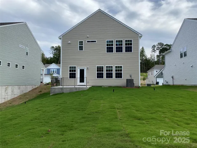 a view of a back yard of the house