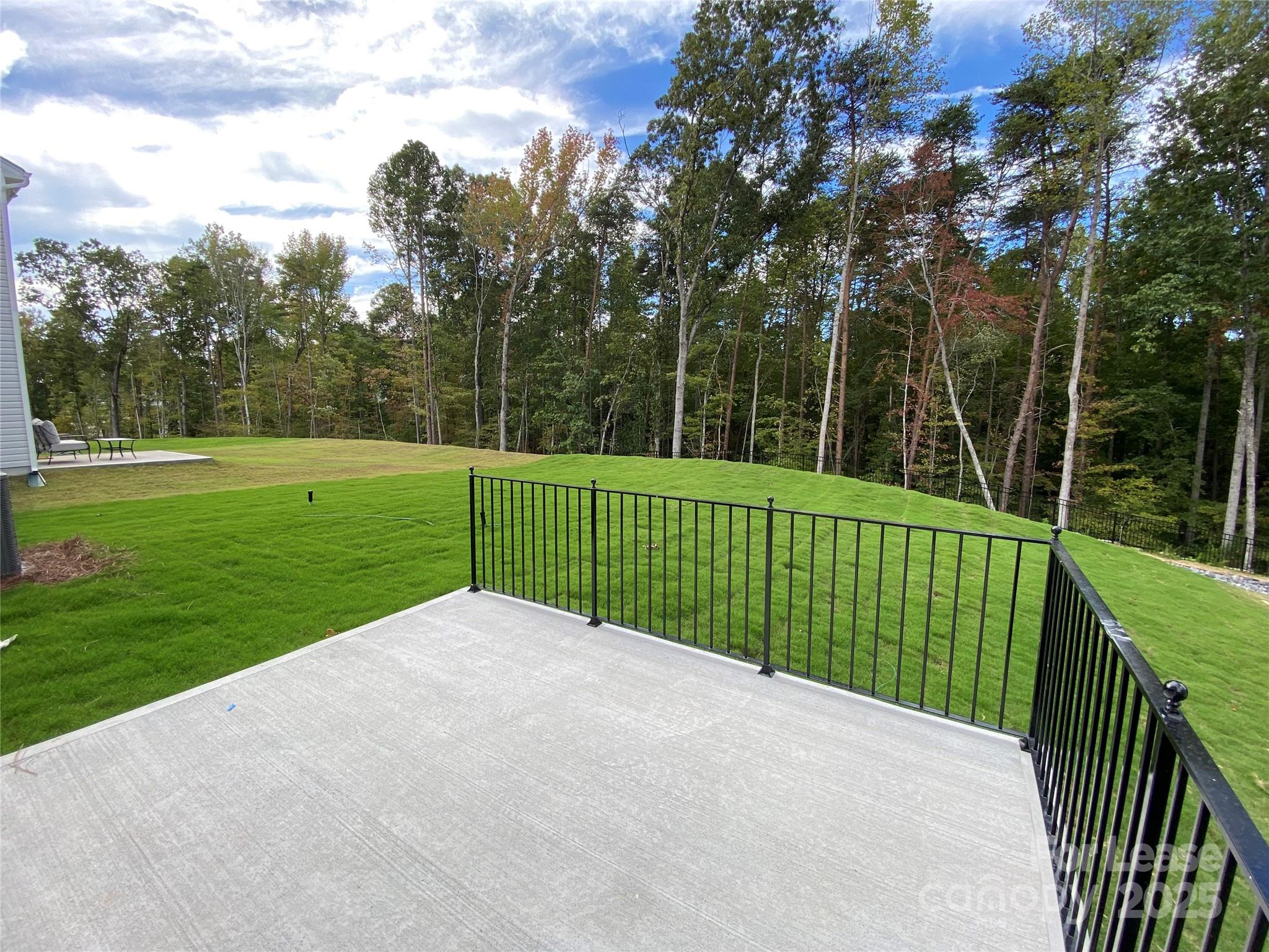 18219 Stark Way Charlotte, NC 28278 - Photo 39 of 42 a view of a golf park with large trees