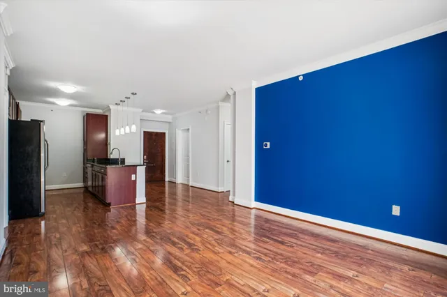 a view of a living room with a flat screen tv