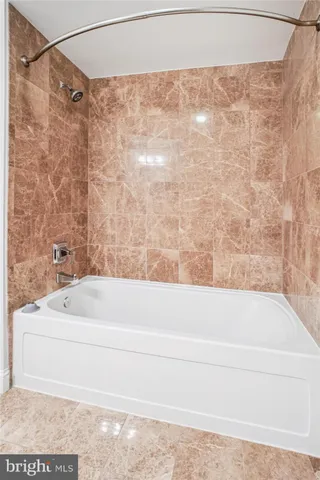 a bathroom with a bathtub