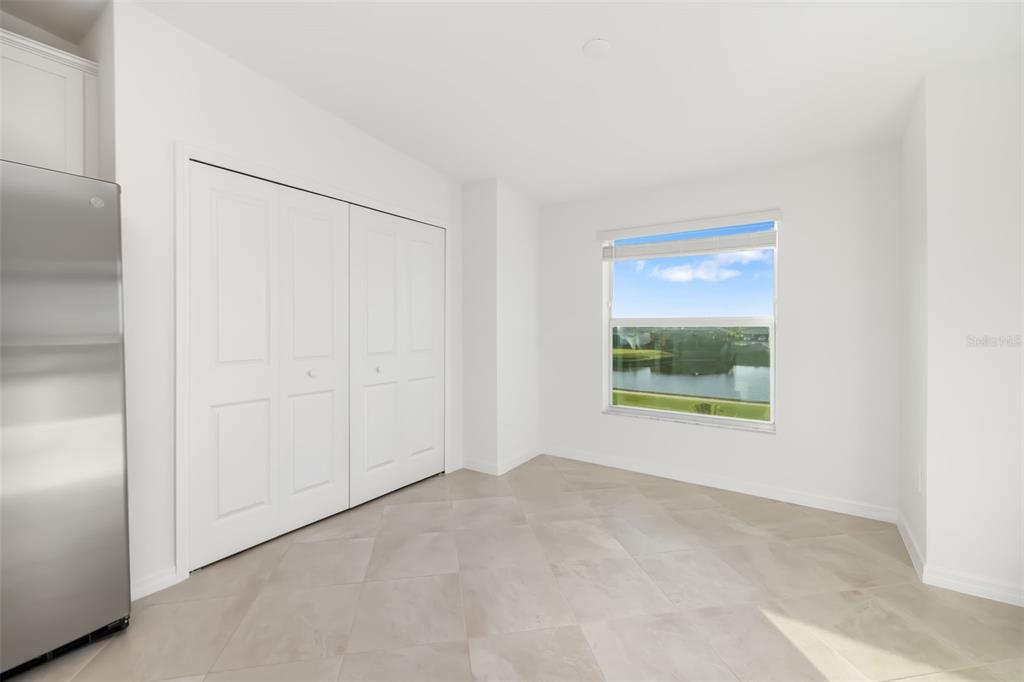 19015 Scallop Loop, Unit 204 Lakewood Ranch, FL 34211 - Photo 17 of 56 a view of an empty room with a window
