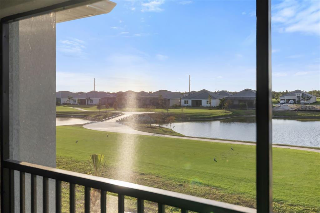 19015 Scallop Loop, Unit 204 Lakewood Ranch, FL 34211 - Photo 24 of 56 a view of lake from balcony