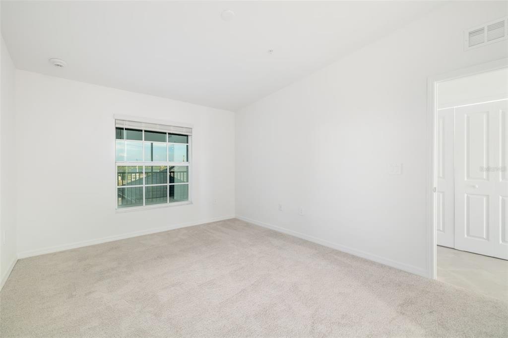 19015 Scallop Loop, Unit 204 Lakewood Ranch, FL 34211 - Photo 27 of 56 an empty room with a window