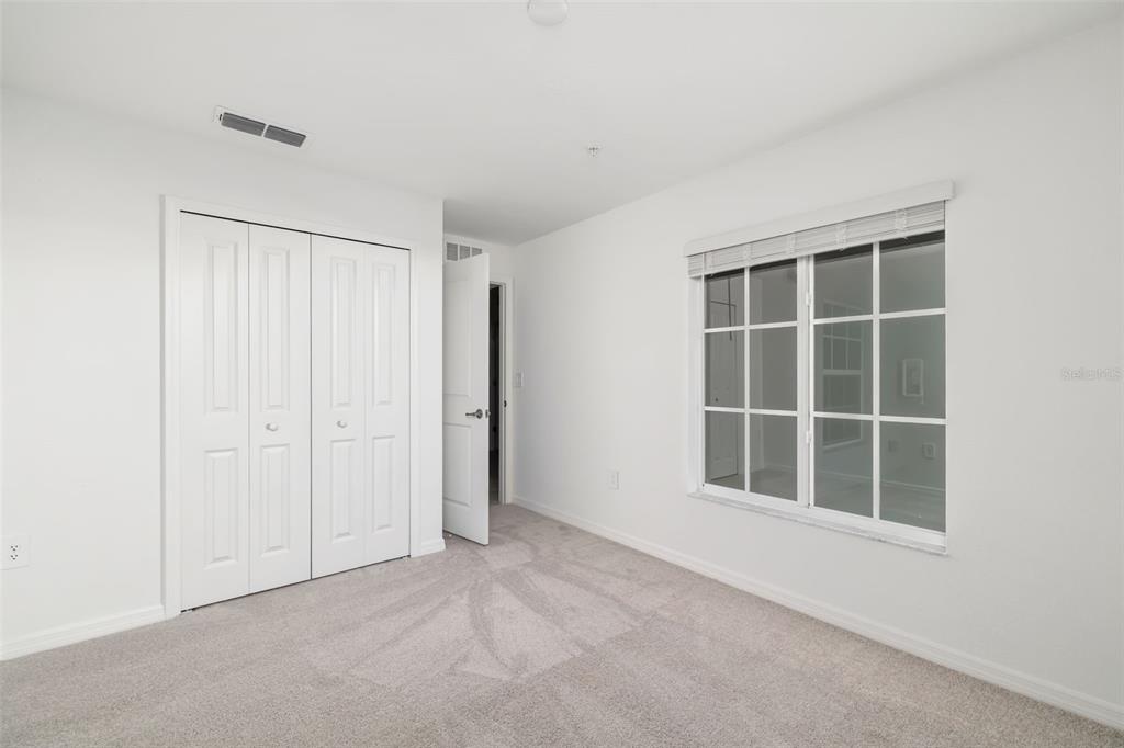 19015 Scallop Loop, Unit 204 Lakewood Ranch, FL 34211 - Photo 31 of 56 a view of an empty room with a window