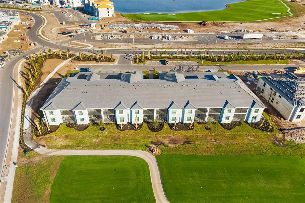 19015 Scallop Loop, Unit 204 Lakewood Ranch, FL 34211 - Photo 37 of 56 an aerial view of residential houses with outdoor space