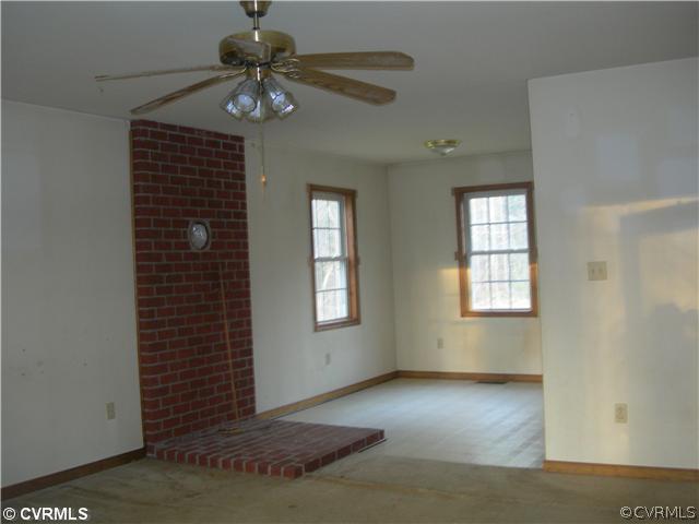 16675 Jolly Road Disputanta, VA 23842 - Photo 3 of 6 a view of an empty room with a window